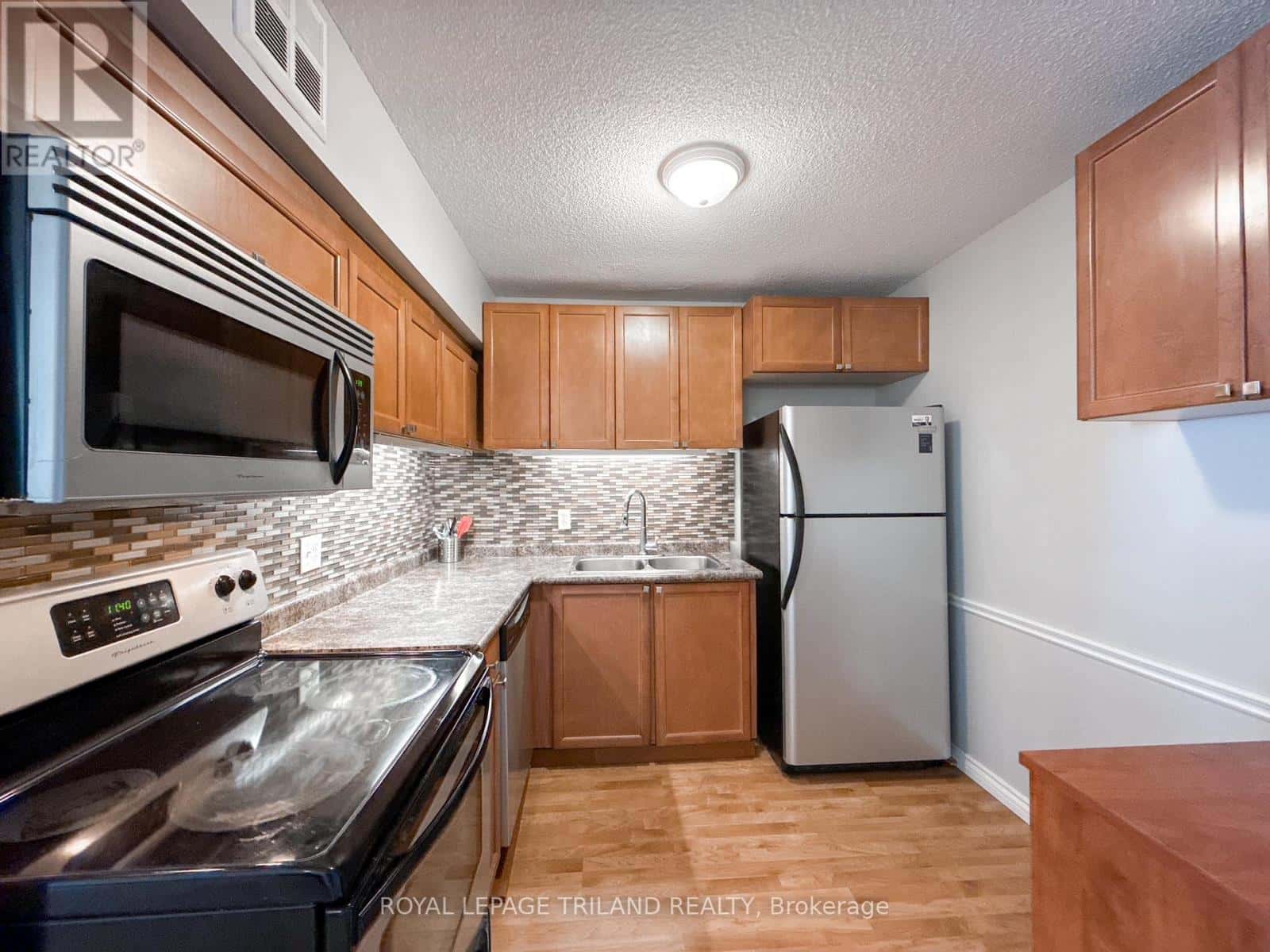 110 - 5 JACKSWAY CRESCENT — London North (North G), Ontario - Photo 2 of 17