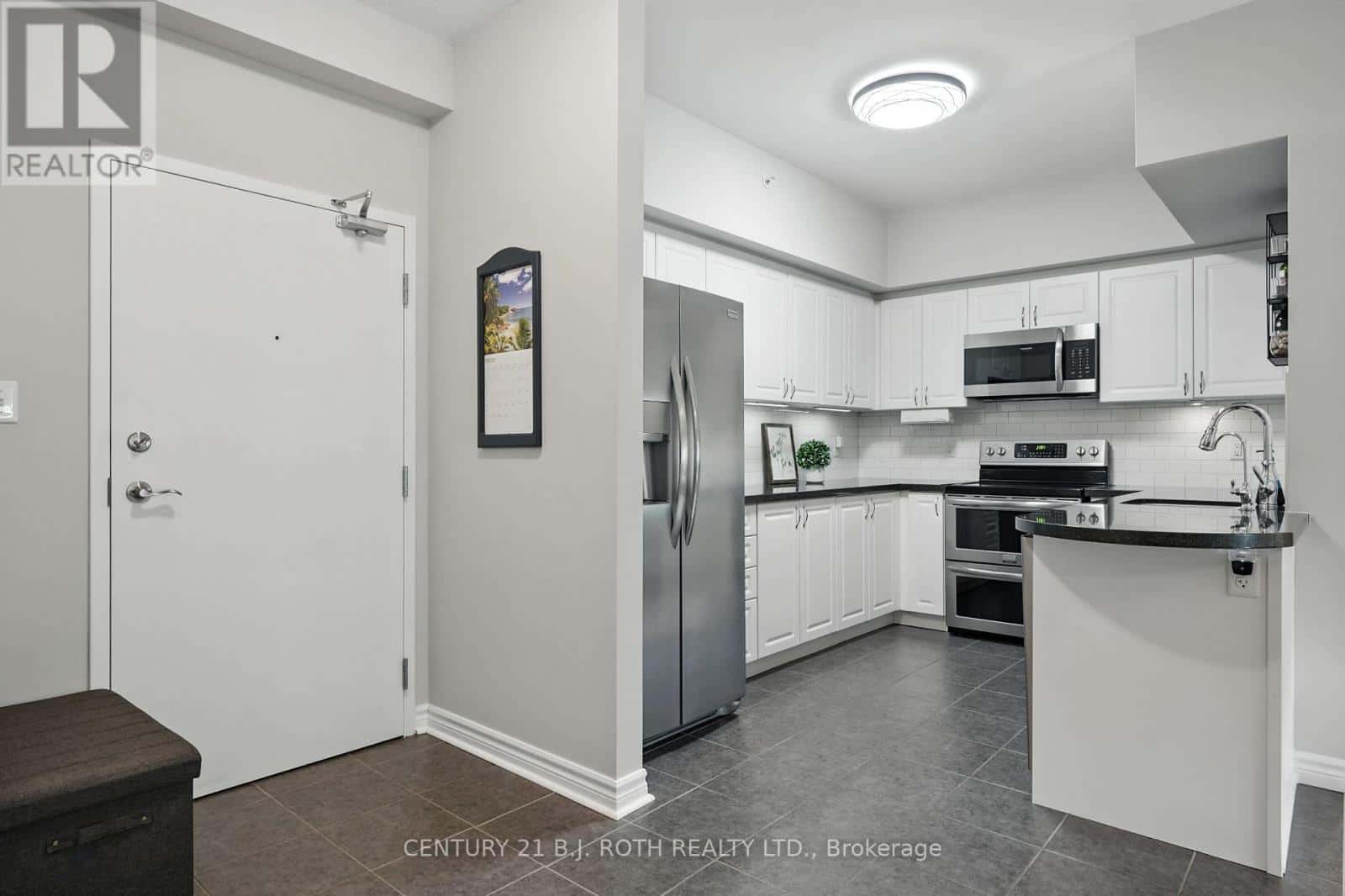 112 - 306 ESSA ROAD — Barrie (0 West), Ontario - Photo 5 of 34