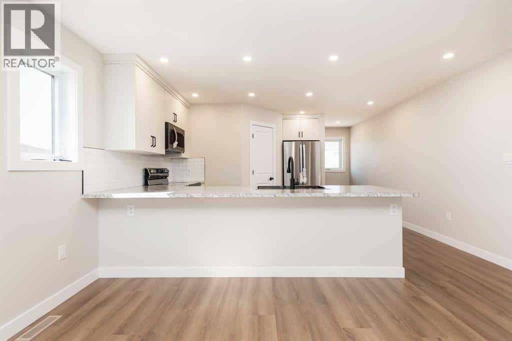 131 11 Street — Fort Macleod, Alberta - Photo 5 of 32