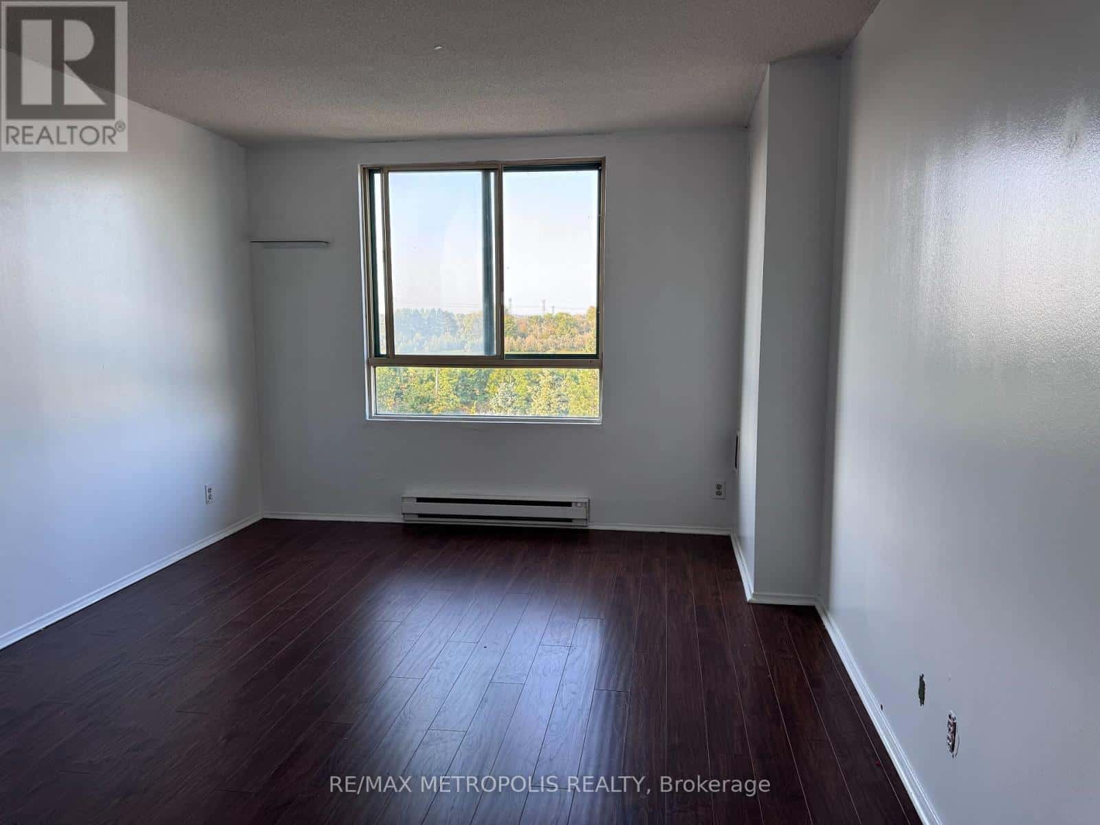 602 - 61 MARKBROOK LANE — Toronto (Mount Olive-Silverstone-Jamestown), Ontario - Photo 3 of 24