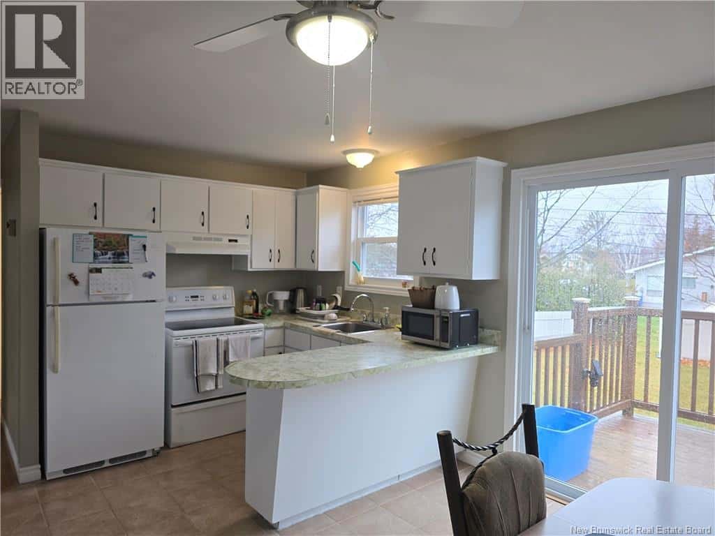 242 Foulem — Beresford, New Brunswick - Photo 3 of 29