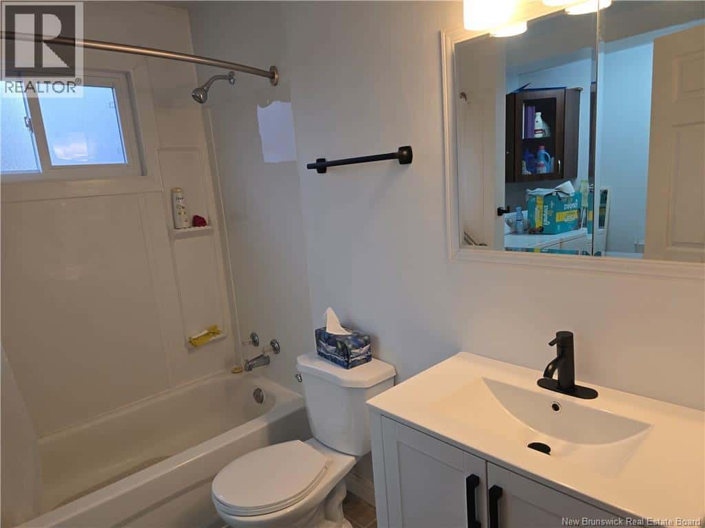 242 Foulem — Beresford, New Brunswick - Photo 2 of 29