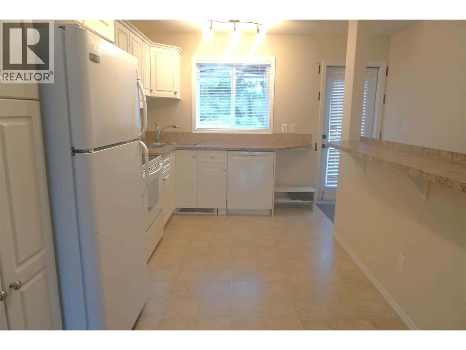 8895 Doherty Street — Canal Flats, British Columbia - Photo 5 of 31