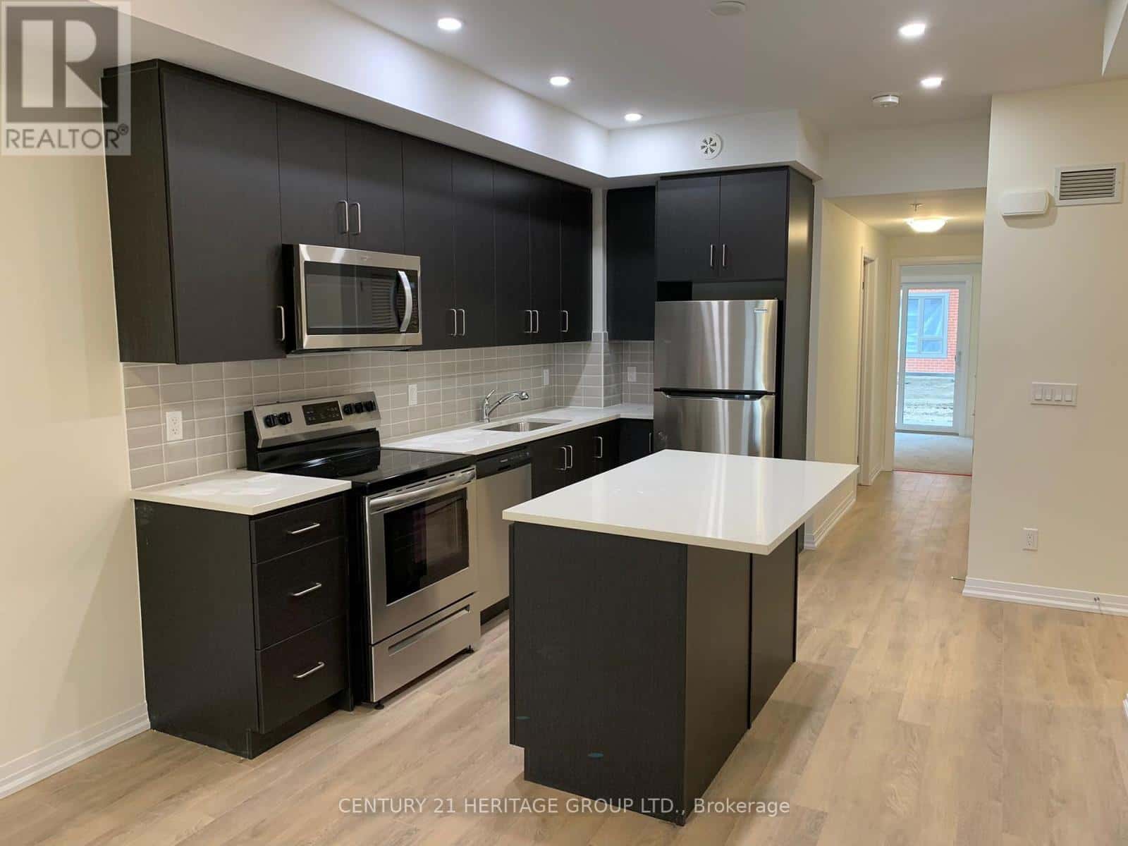 308 - 2635 WILLIAM JACKSON DRIVE — Pickering (Duffin Heights), Ontario - Photo 2 of 11