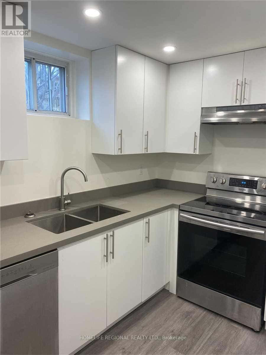 LOWER LEVEL - 46 TEWSLEY PLACE — Toronto (Willowridge-Martingrove-Richview), Ontario - Photo 4 of 24