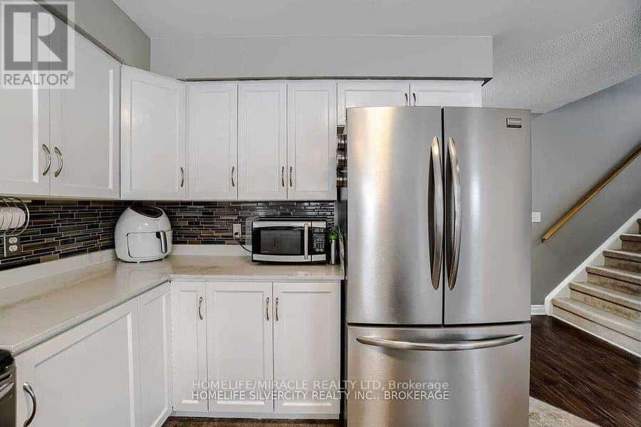 UPPERS EXCLUDE BASEMENT - 19 PATTERSON DRIVE — North Dumfries, Ontario - Photo 3 of 25