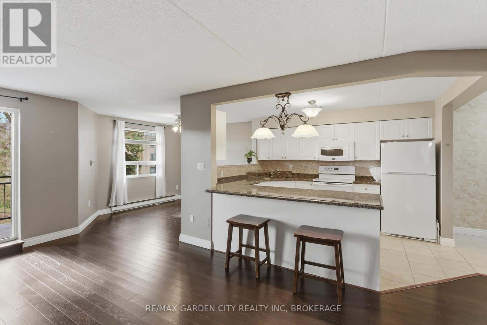 230 - 4658 DRUMMOND ROAD — Niagara Falls (Cherrywood), Ontario - Photo 4 of 35