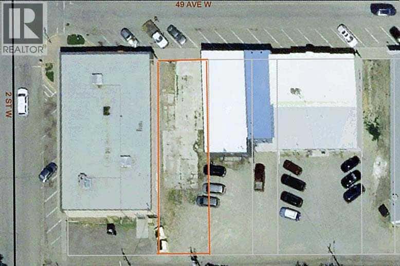 135 49th Avenue W — Claresholm, Alberta - Photo 4 of 5