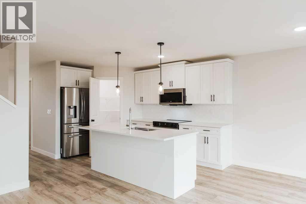 9560 114 Avenue — Clairmont, Alberta - Photo 3 of 47