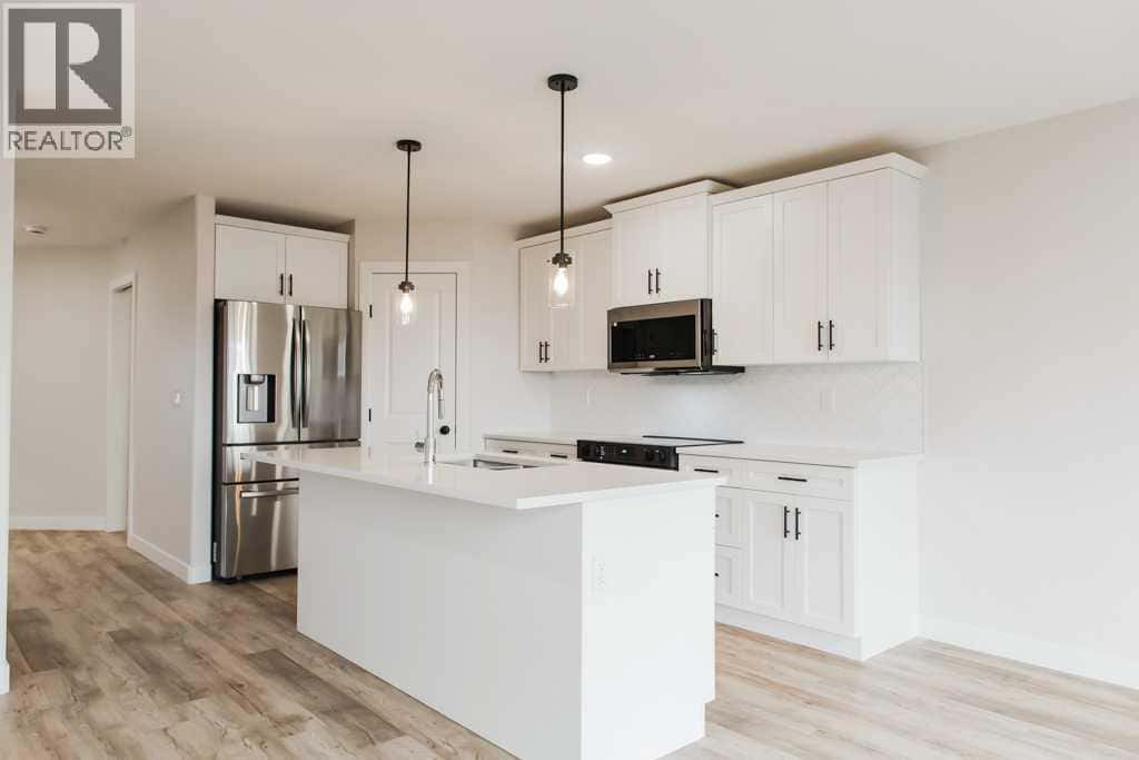 9558 114 Avenue — Clairmont, Alberta - Photo 4 of 47