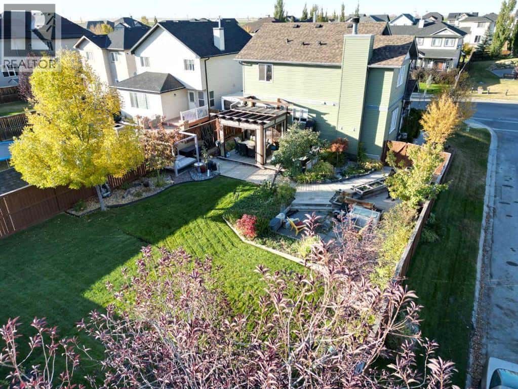 21 Mckinnon Street NW — Langdon, Alberta - Photo 2 of 46