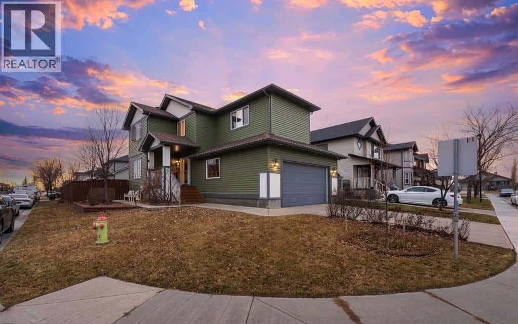 21 Mckinnon Street NW — Langdon, Alberta - Photo 4 of 46