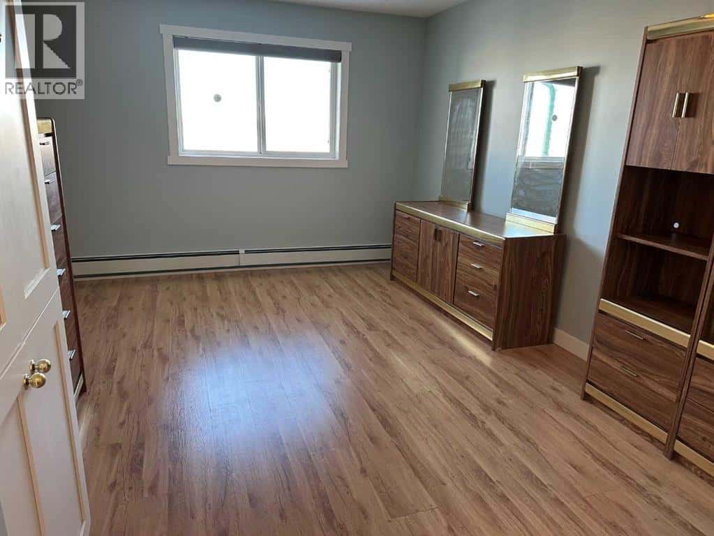 403, 1881 17 Street — Didsbury, Alberta - Photo 4 of 24