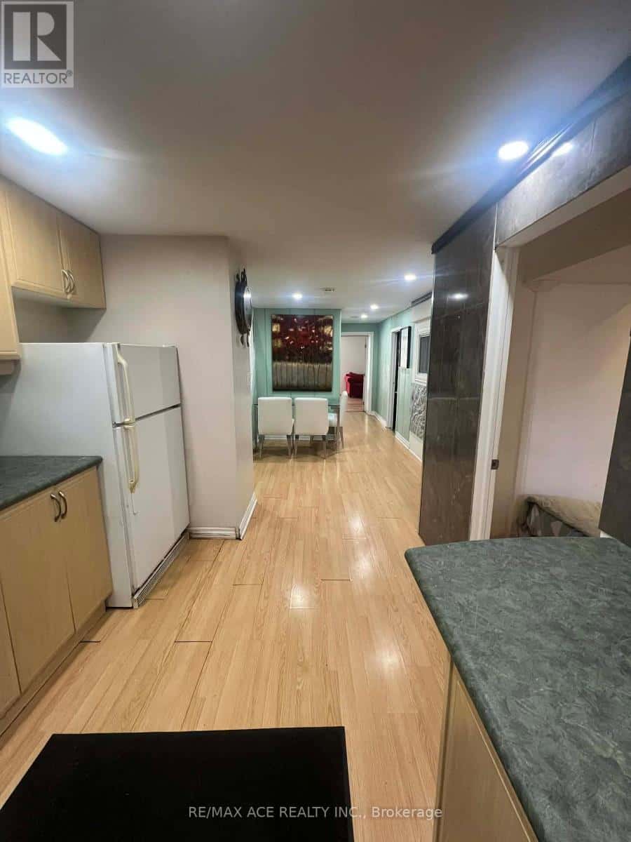 BSMT - 3715 ST CLAIR AVENUE E — Toronto (Cliffcrest), Ontario - Photo 3 of 11