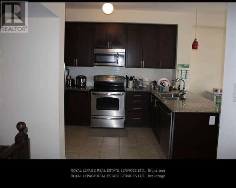 56 - 165 HAMPSHIRE WAY — Milton (DE Dempsey), Ontario - Photo 3 of 4