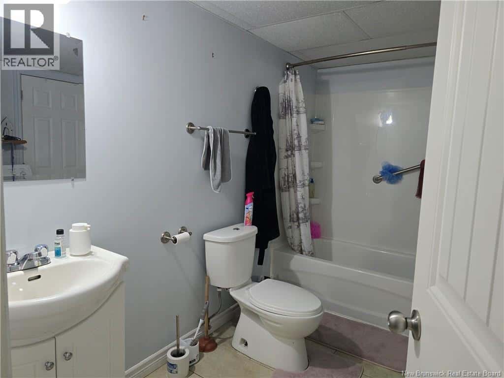 992 Principale — Beresford, New Brunswick - Photo 2 of 35