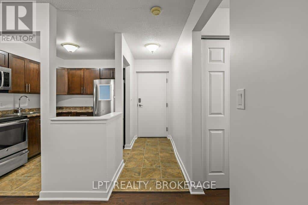 107 - 310 KINGSDALE AVENUE — Kingston (East Gardiners Rd), Ontario - Photo 3 of 21