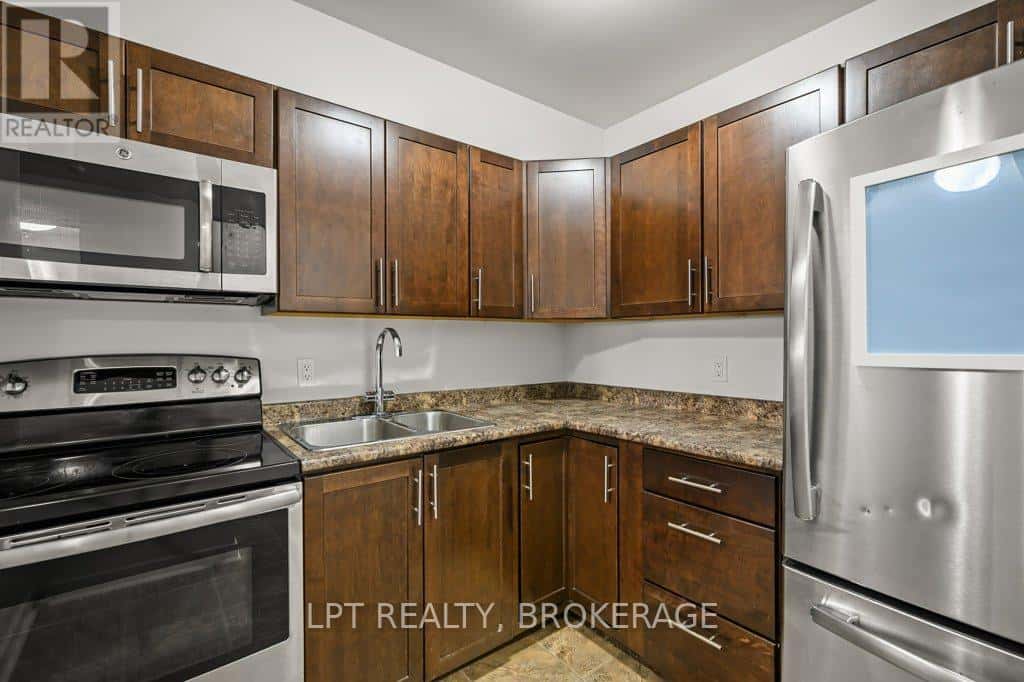 107 - 310 KINGSDALE AVENUE — Kingston (East Gardiners Rd), Ontario - Photo 4 of 21