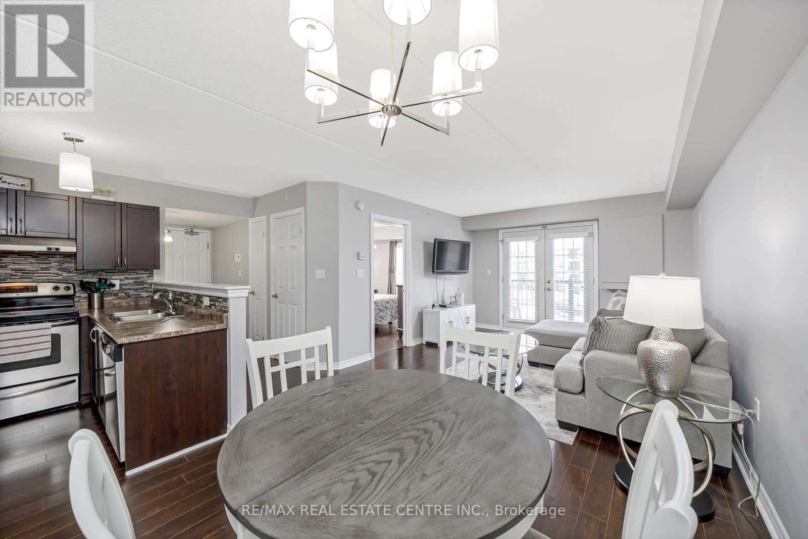 304 - 1360 MAIN STREET E — Milton (DE Dempsey), Ontario - Photo 2 of 33