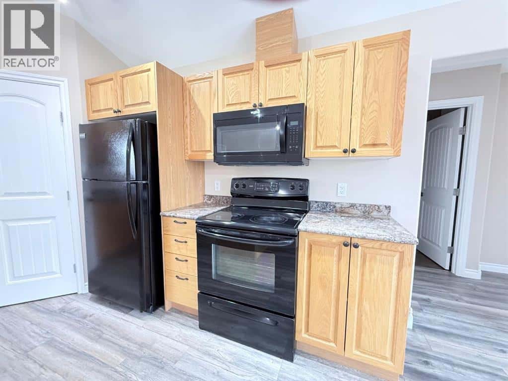 111 1 Street N — Marwayne, Alberta - Photo 4 of 27