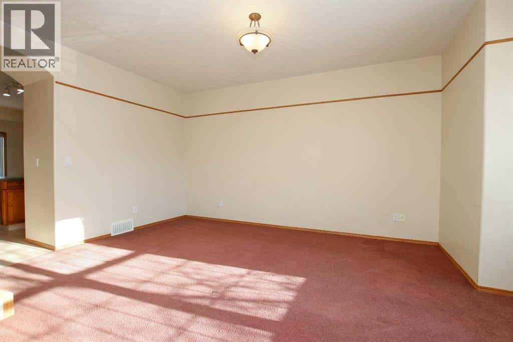 25 Adams Close — Red Deer, Alberta - Photo 4 of 42