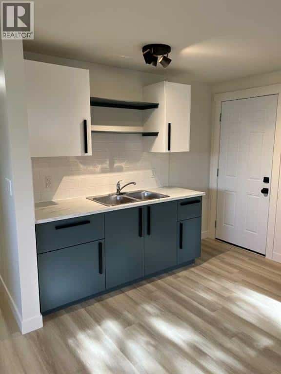 4932 57 Avenue — Taber, Alberta - Photo 3 of 29