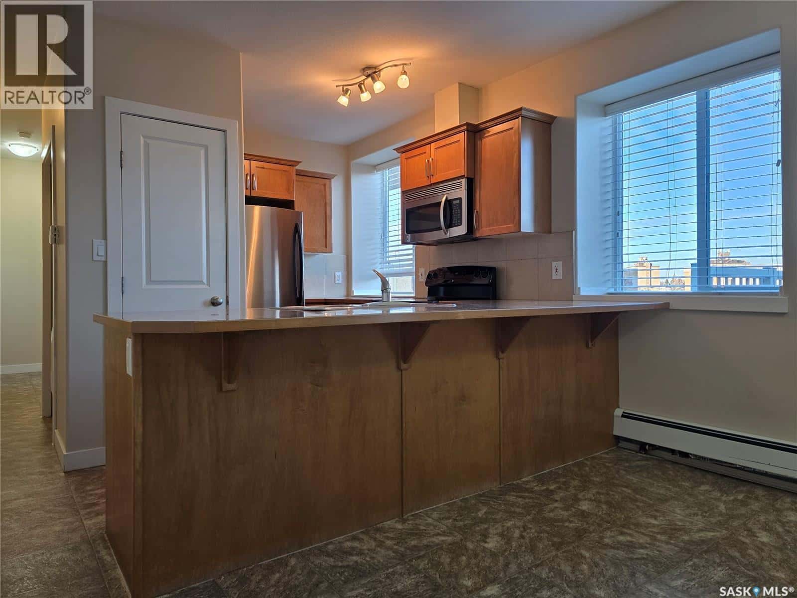 108 302 Bemister AVENUE E — Melfort, Saskatchewan - Photo 5 of 13