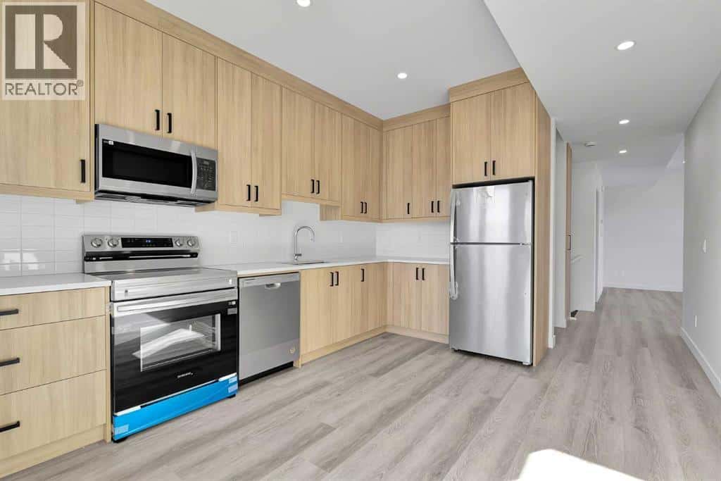 4905 Bowness Road NW — Calgary, Alberta - Photo 3 of 29