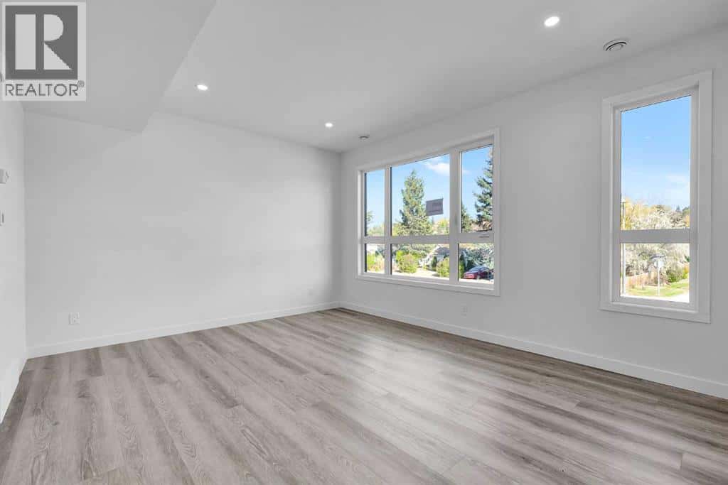 4905 Bowness Road NW — Calgary, Alberta - Photo 5 of 29