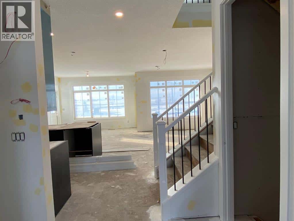 40 Fieldstone Close — Balzac, Alberta - Photo 4 of 43