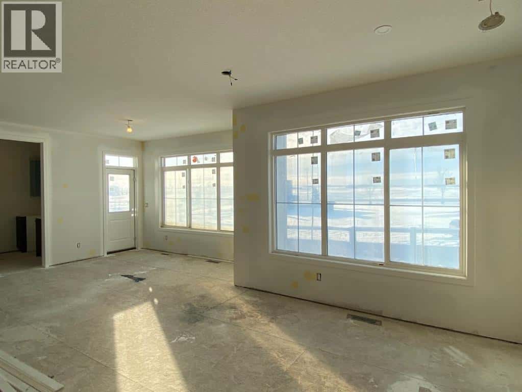 40 Fieldstone Close — Balzac, Alberta - Photo 5 of 43