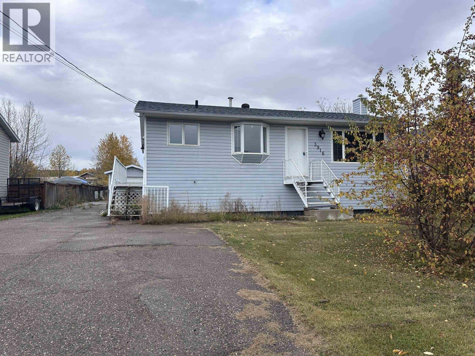 3916 COTTONWOOD ROAD — Fort Nelson, British Columbia - Photo 2 of 30