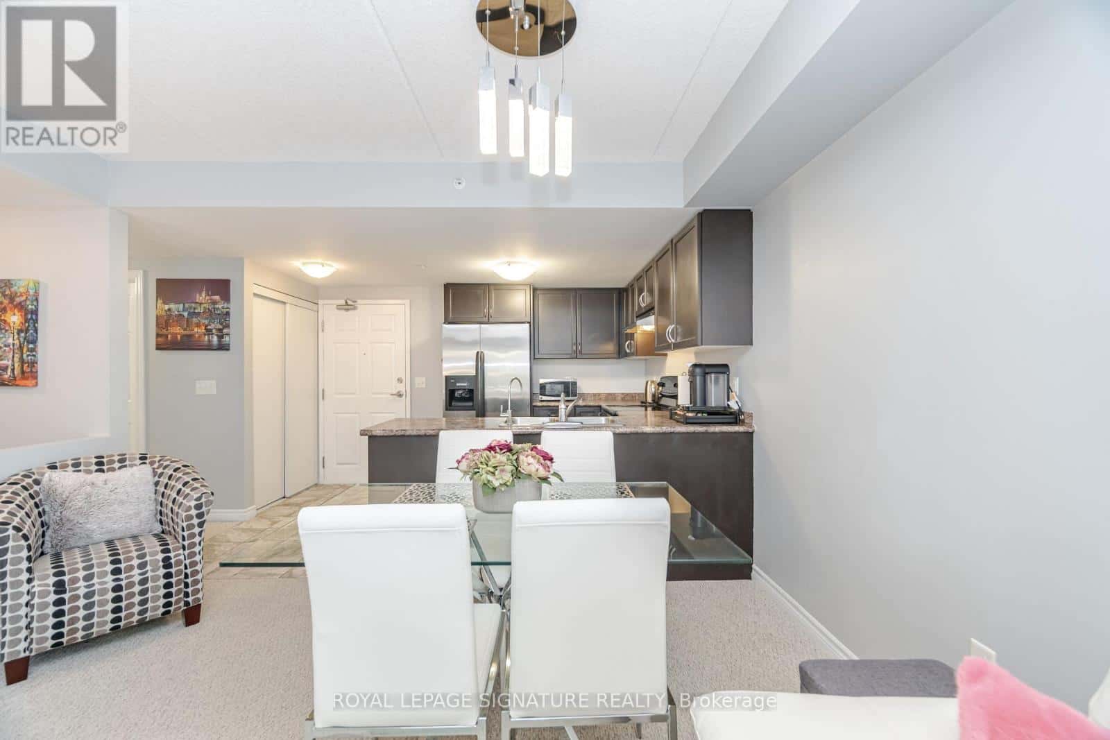 111 - 67 KINGSBURY SQUARE — Guelph (Pineridge/Westminster Woods), Ontario - Photo 5 of 28