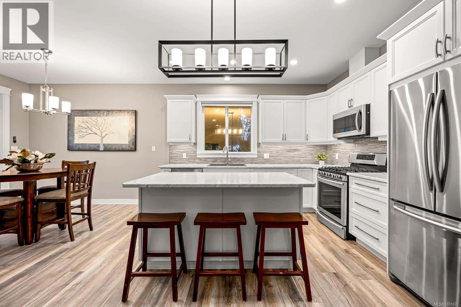 8965 McLarey Ave — Black Creek, British Columbia - Photo 3 of 28