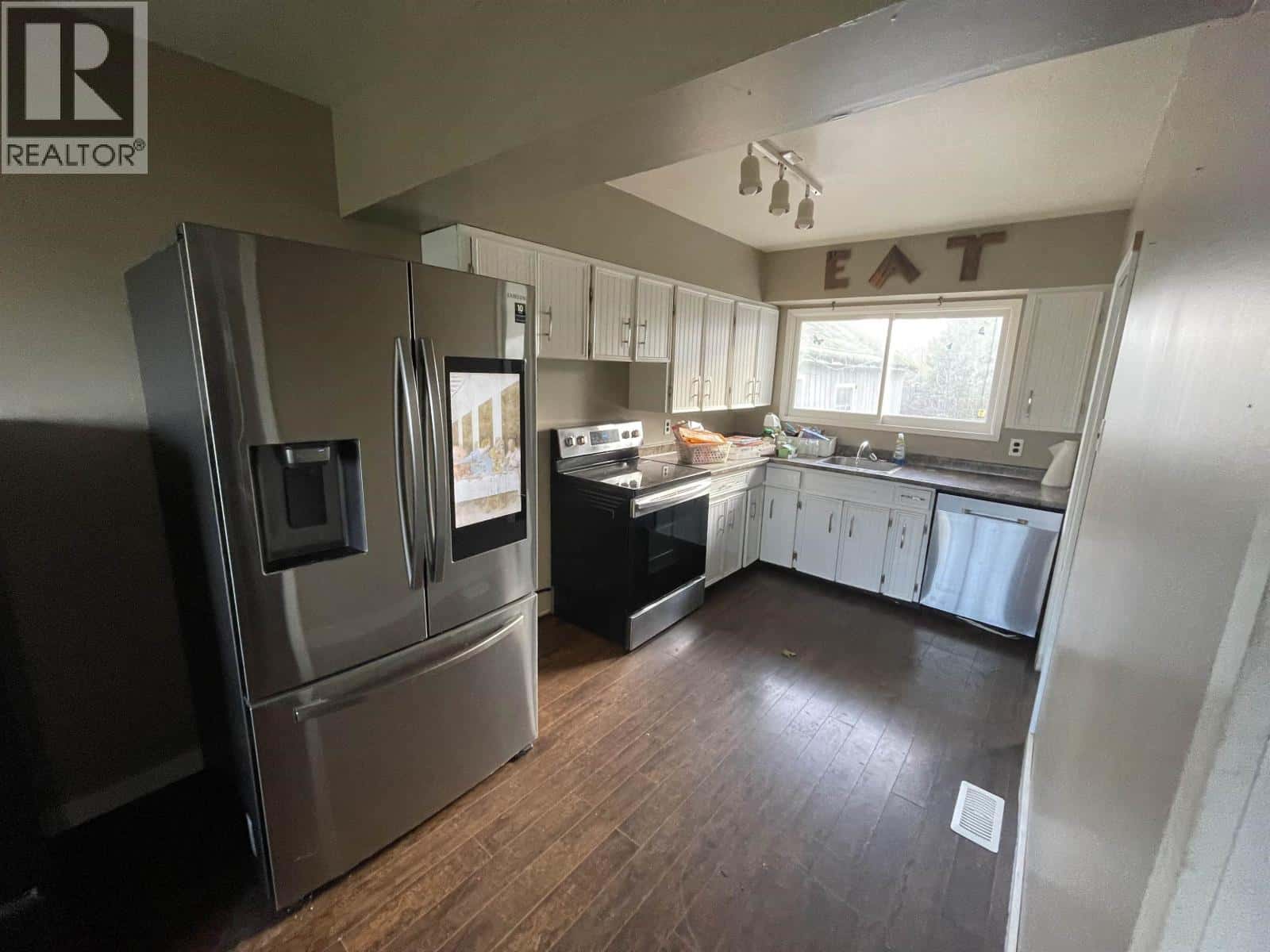 4815 POHLE AVENUE — Terrace, British Columbia - Photo 4 of 10