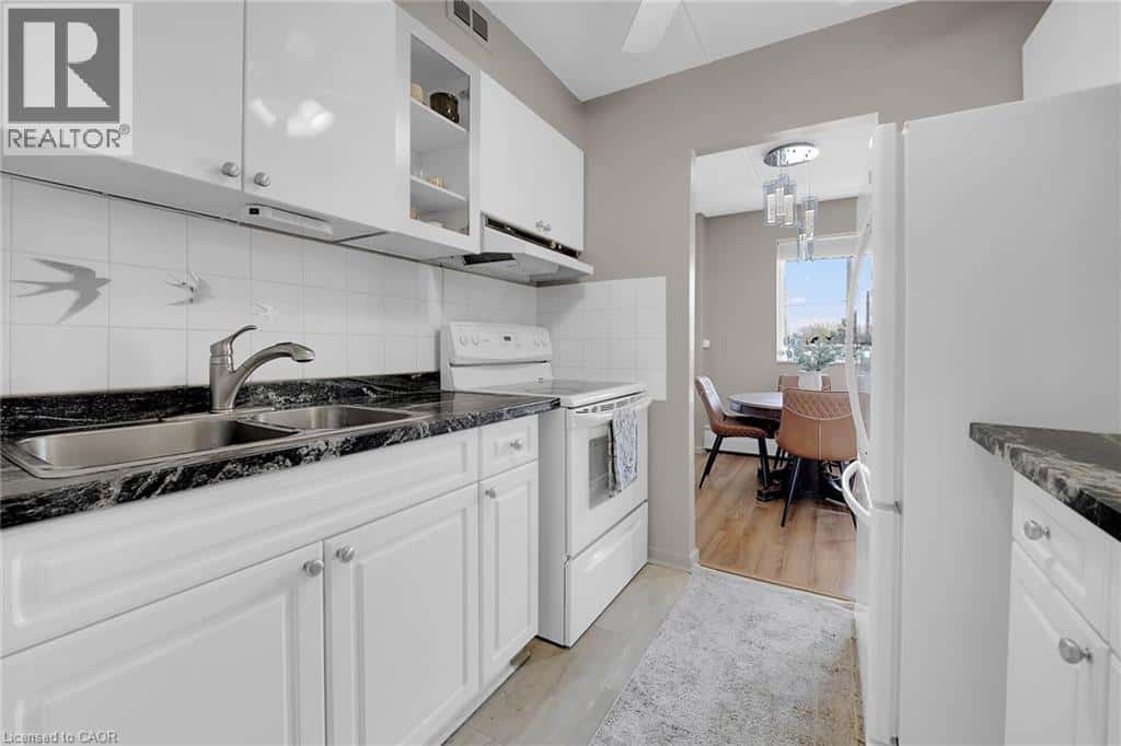 198 SCOTT Street Unit# 220 — St. Catharines, Ontario - Photo 4 of 43