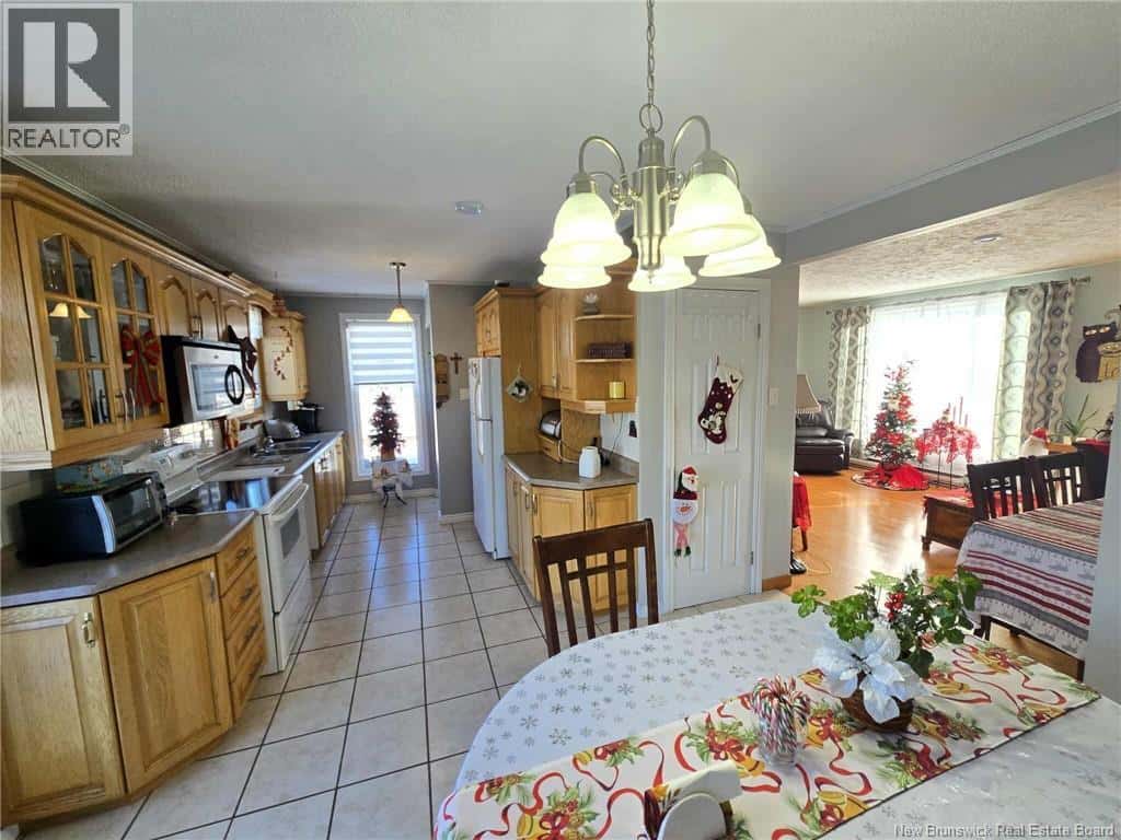 210 Francine — Beresford, New Brunswick - Photo 5 of 39
