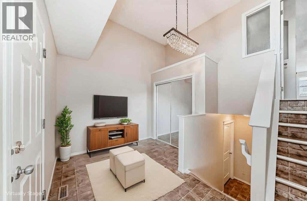 576 Stonegate Way NW — Airdrie, Alberta - Photo 3 of 27