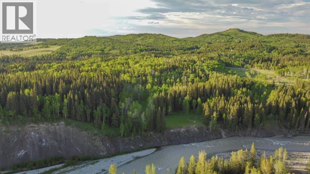 231175 Bracken Road — Bragg Creek, Alberta - Photo 5 of 34