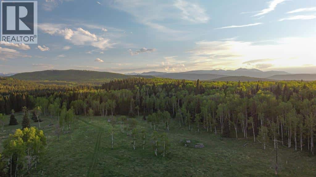 231175 Bracken Road — Bragg Creek, Alberta - Photo 4 of 34