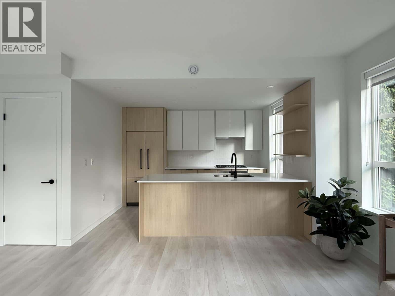 210 2045 HERITAGE PARK LANE — North Vancouver, British Columbia - Photo 3 of 15