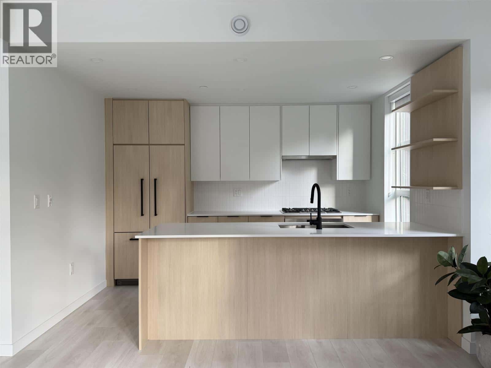 210 2045 HERITAGE PARK LANE — North Vancouver, British Columbia - Photo 5 of 15