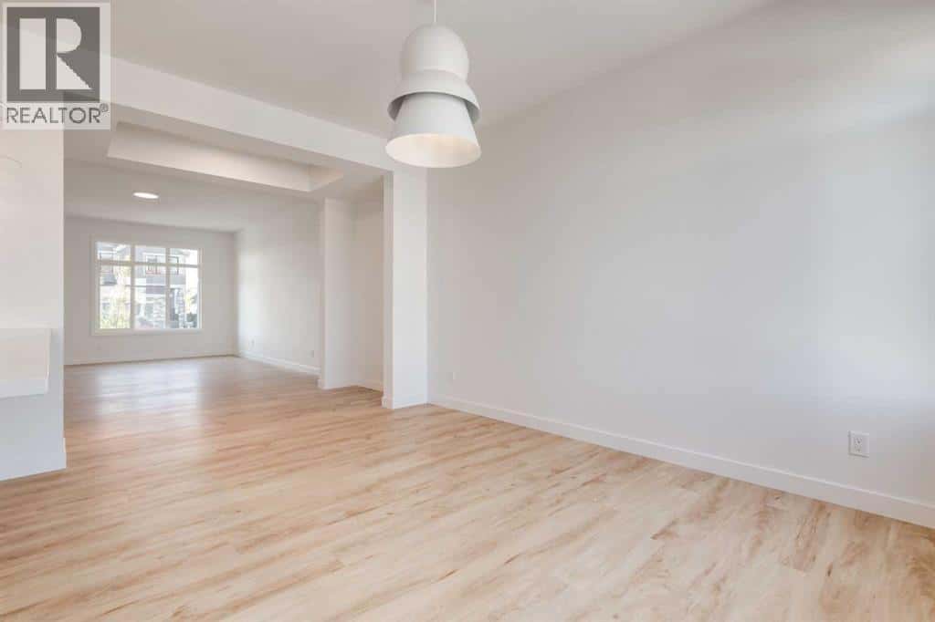 201 Tillotson Drive — Okotoks, Alberta - Photo 5 of 25