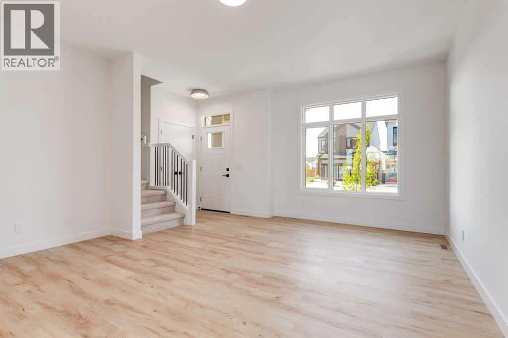 201 Tillotson Drive — Okotoks, Alberta - Photo 3 of 25