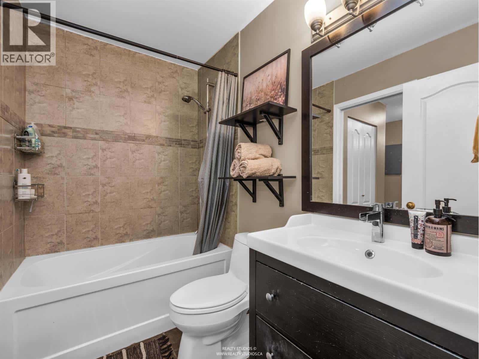 315 888 GAUTHIER AVENUE — Coquitlam, British Columbia - Photo 5 of 32