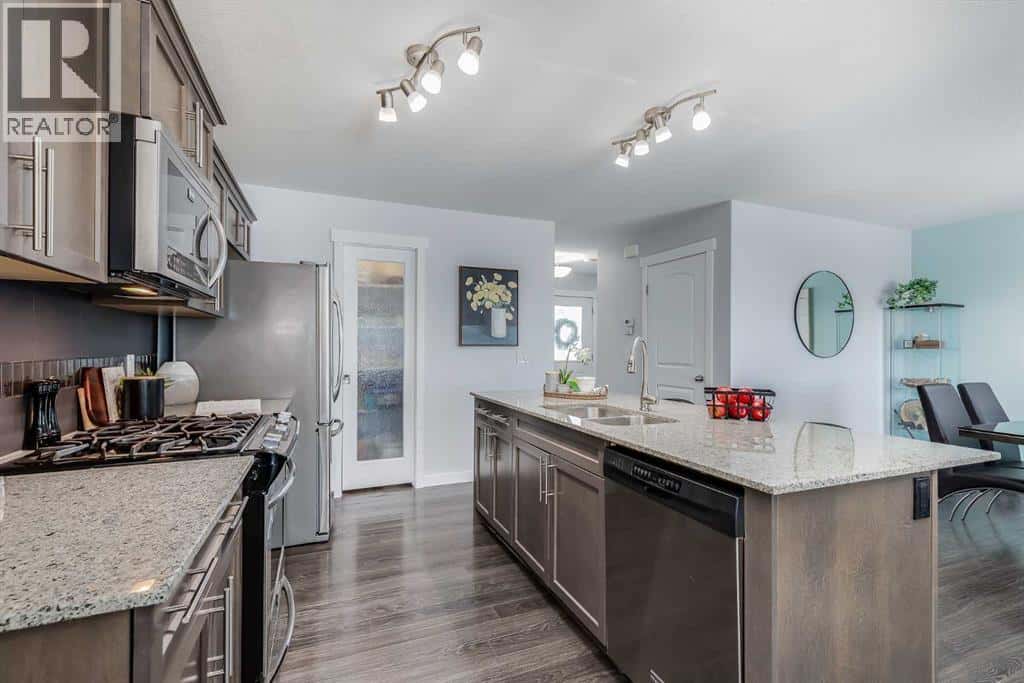 251 Kingsbridge Road SE — Airdrie, Alberta - Photo 3 of 40