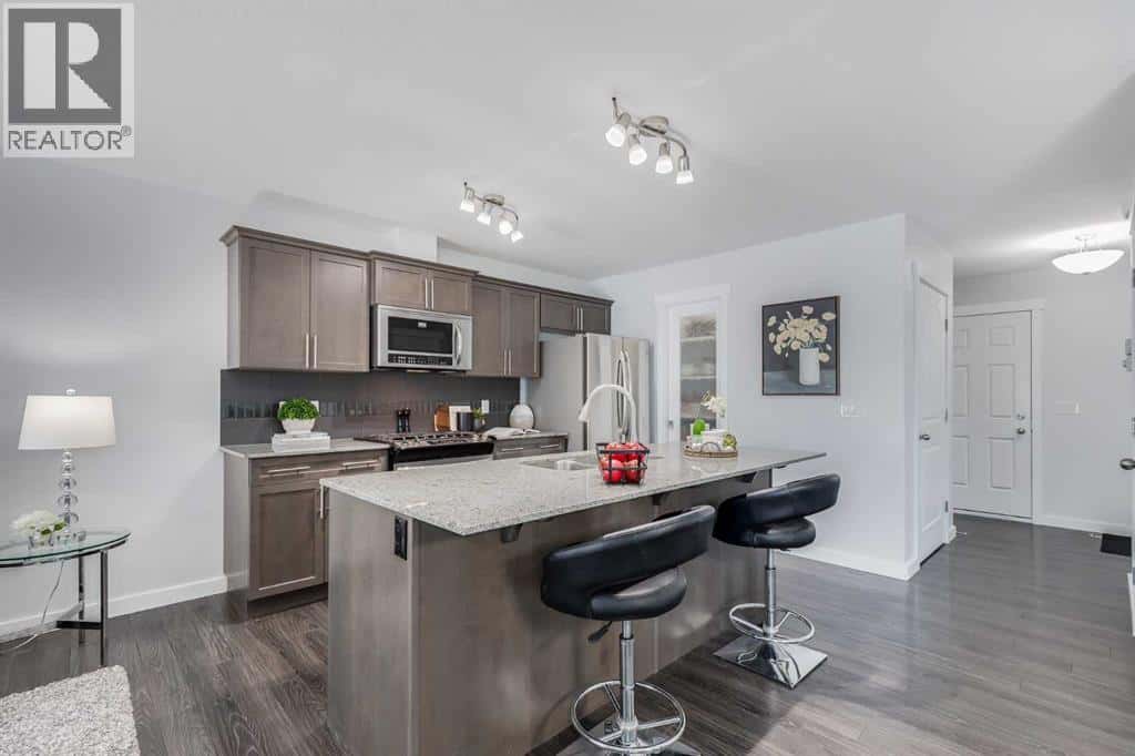 251 Kingsbridge Road SE — Airdrie, Alberta - Photo 2 of 40