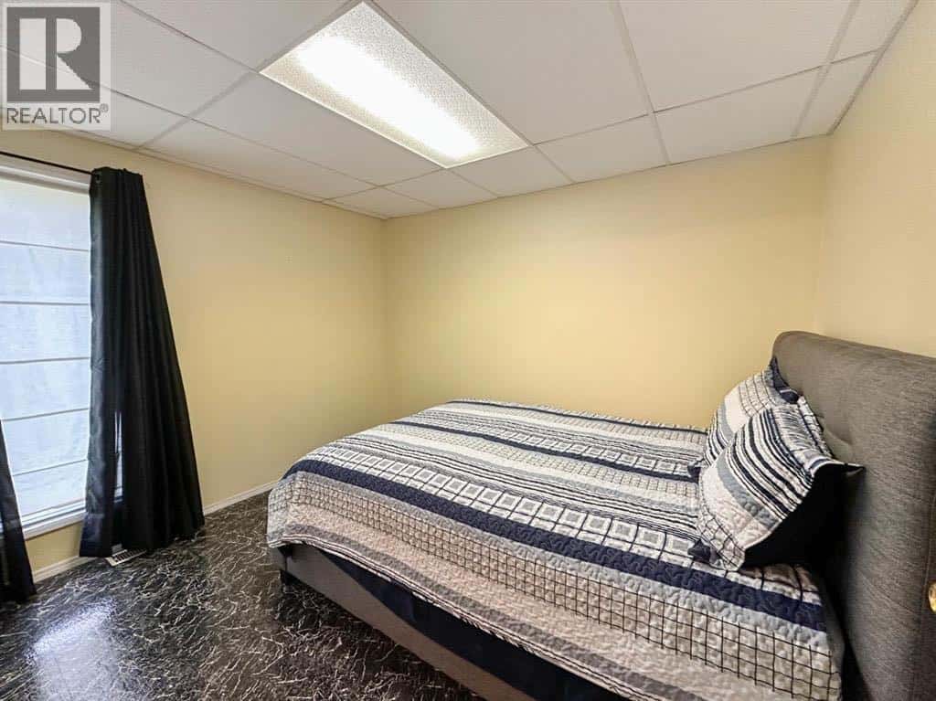 5009 50 Avenue — Valleyview, Alberta - Photo 5 of 13