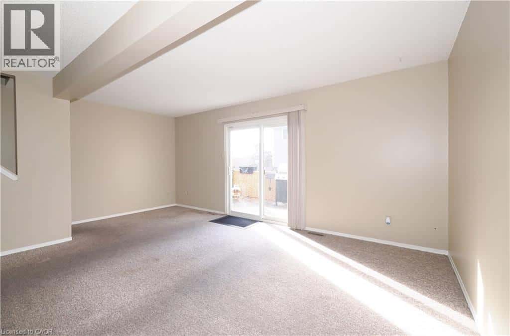 255 NORTHLAKE Drive Unit# 27 — Waterloo, Ontario - Photo 5 of 34