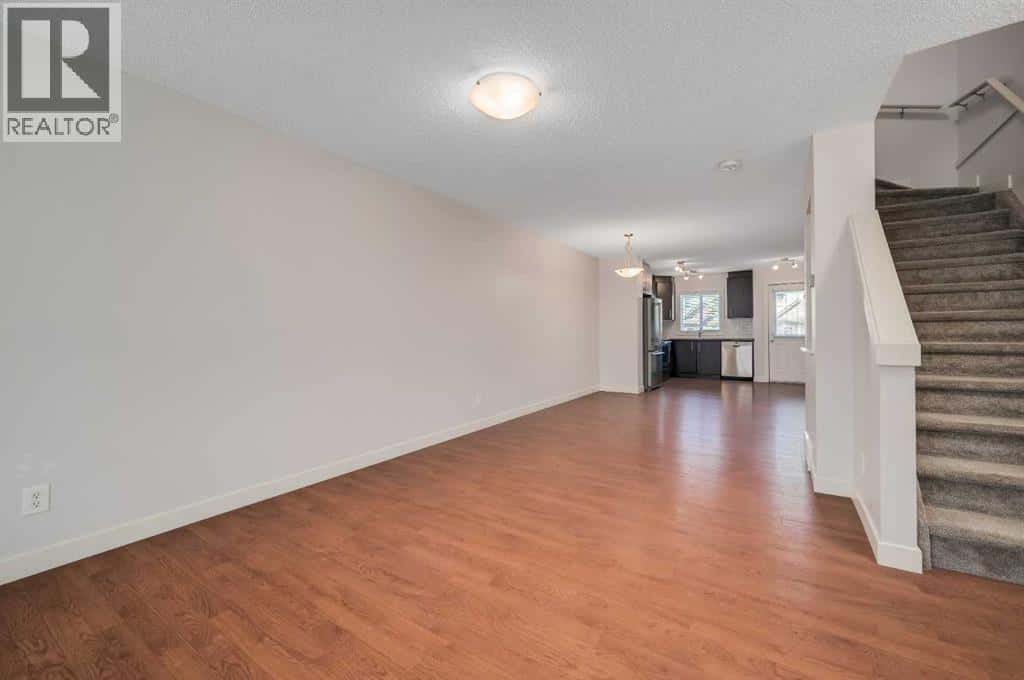 1203, 2445 Kingsland Road SE — Airdrie, Alberta - Photo 4 of 26